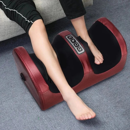 Original supplied lifestyle photograph of the Red foot massager used beside a sofa