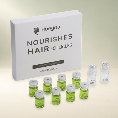 Hoegoa complete hair-care kit with eight 5 mL vials and two applicators on a cream and sage studio background